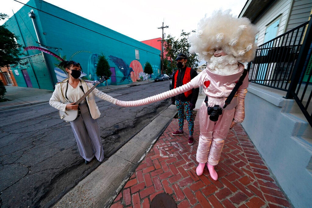 APTOPIX Virus Outbreak Mardi Gras